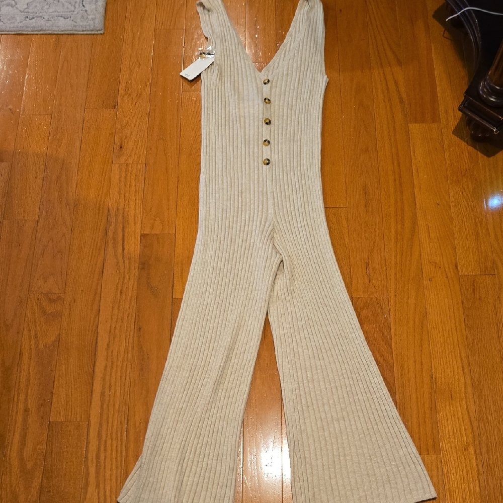 Elegant Cream Ribbed Jumpsuit with Button Accents